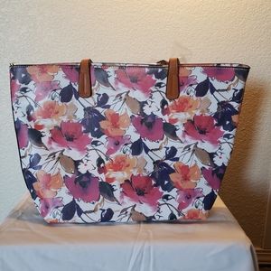Pink and orange faux leather tote.